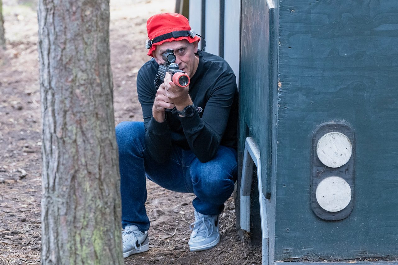 Man holding a Laser gun.