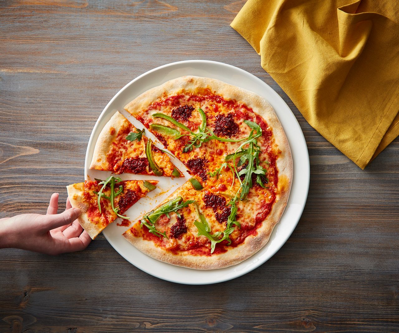 'Nduja pizza topped with rocket