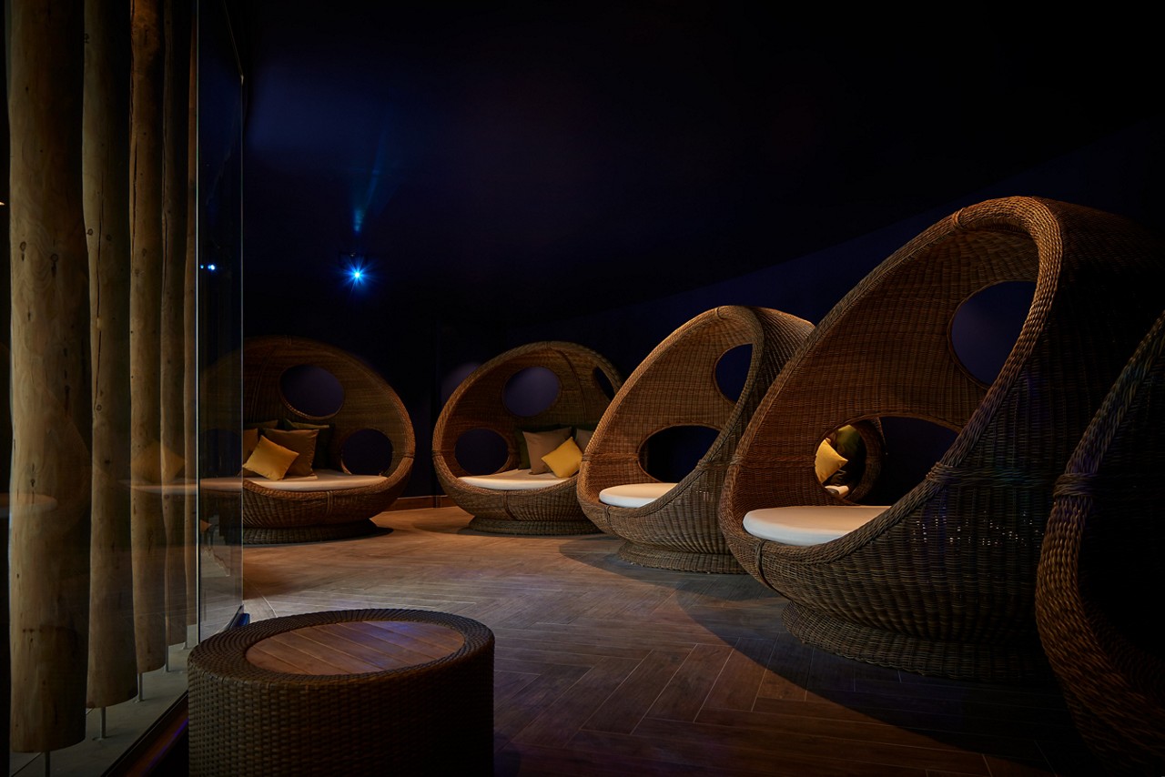 Comfortable cocoon seating in the calming Forest Nesting area.