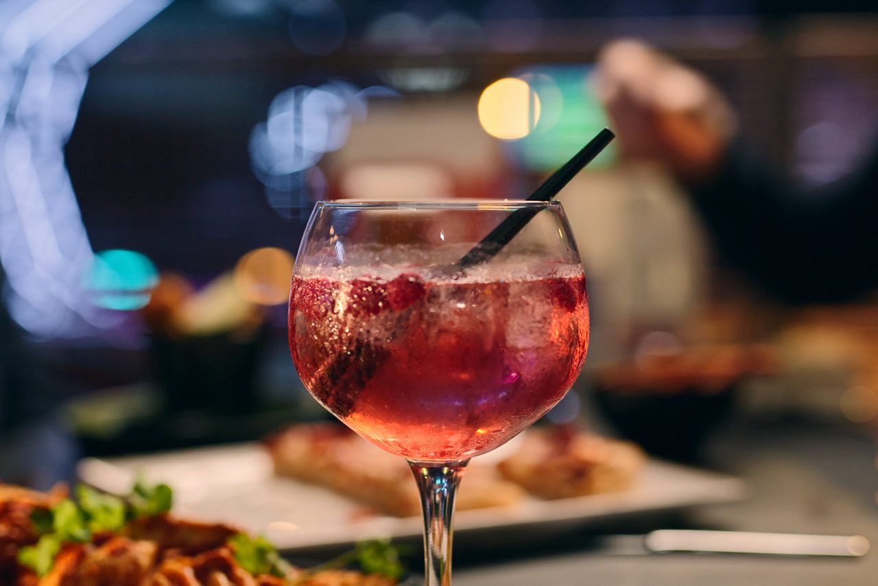 pink drink in a glass on a table