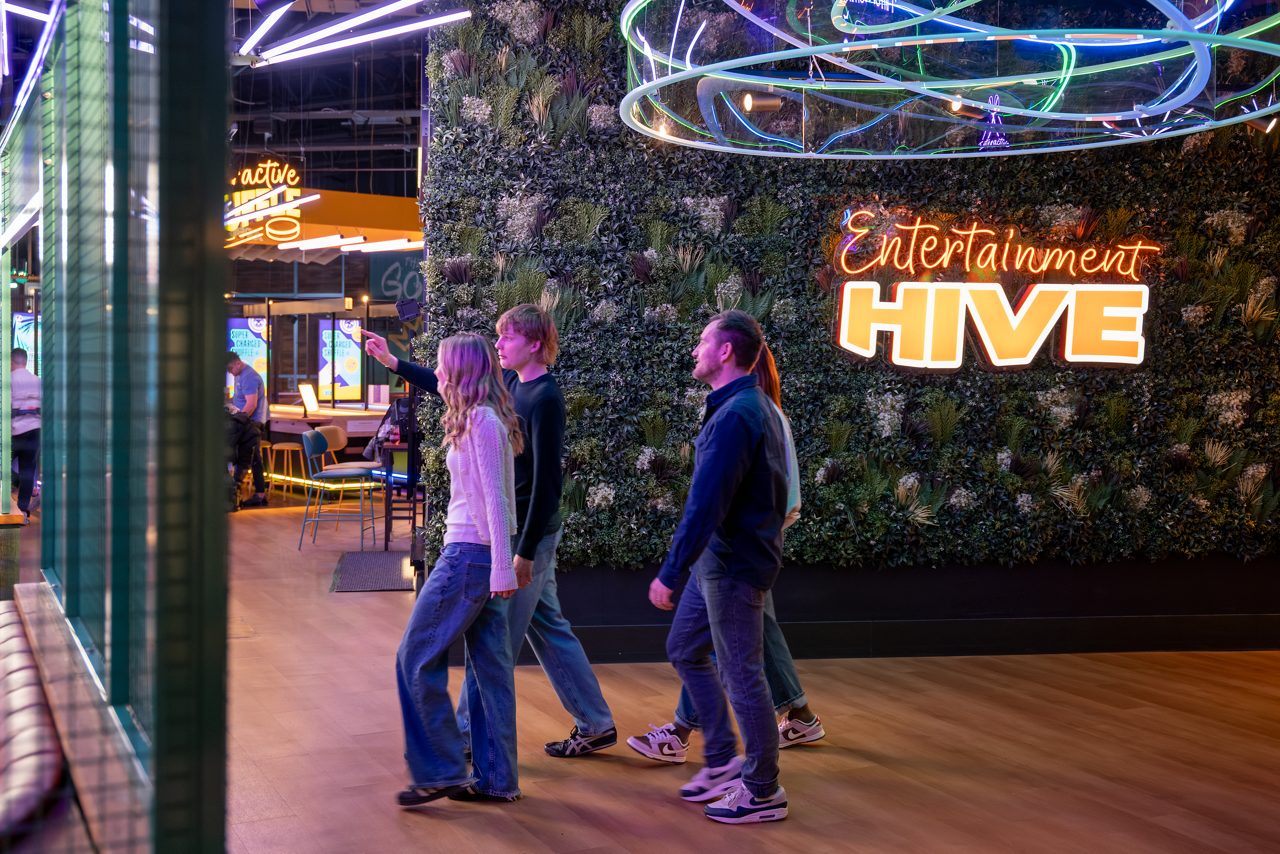 Family entering entertainment hive