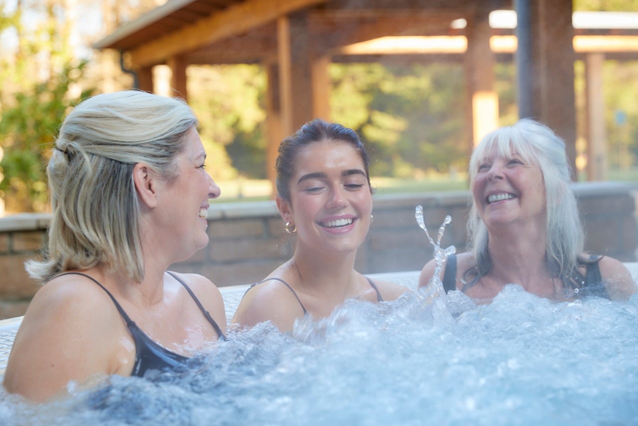 grandma, mum and daughter in the hot tub