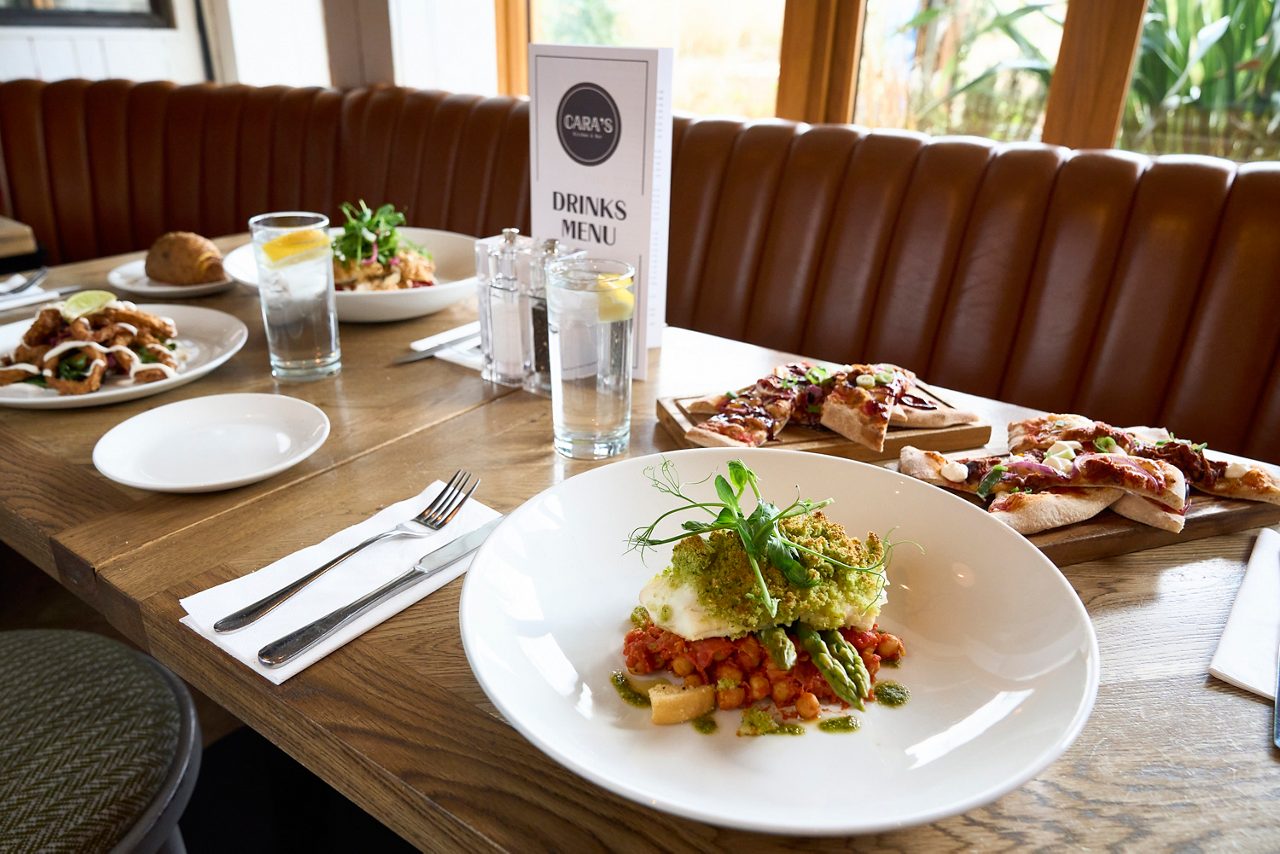 Chocolate pancake stack with drizzle.