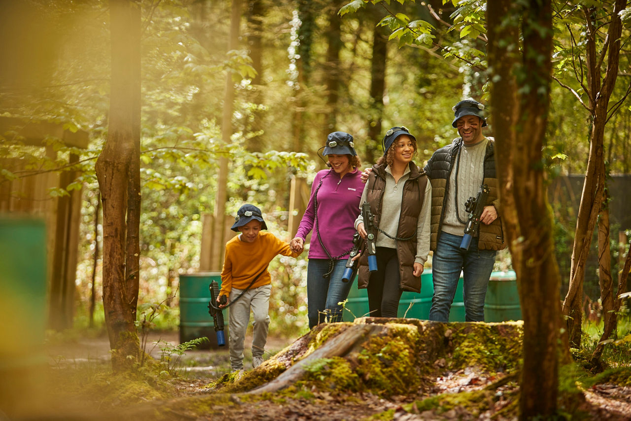 Family playing Laser Combat.