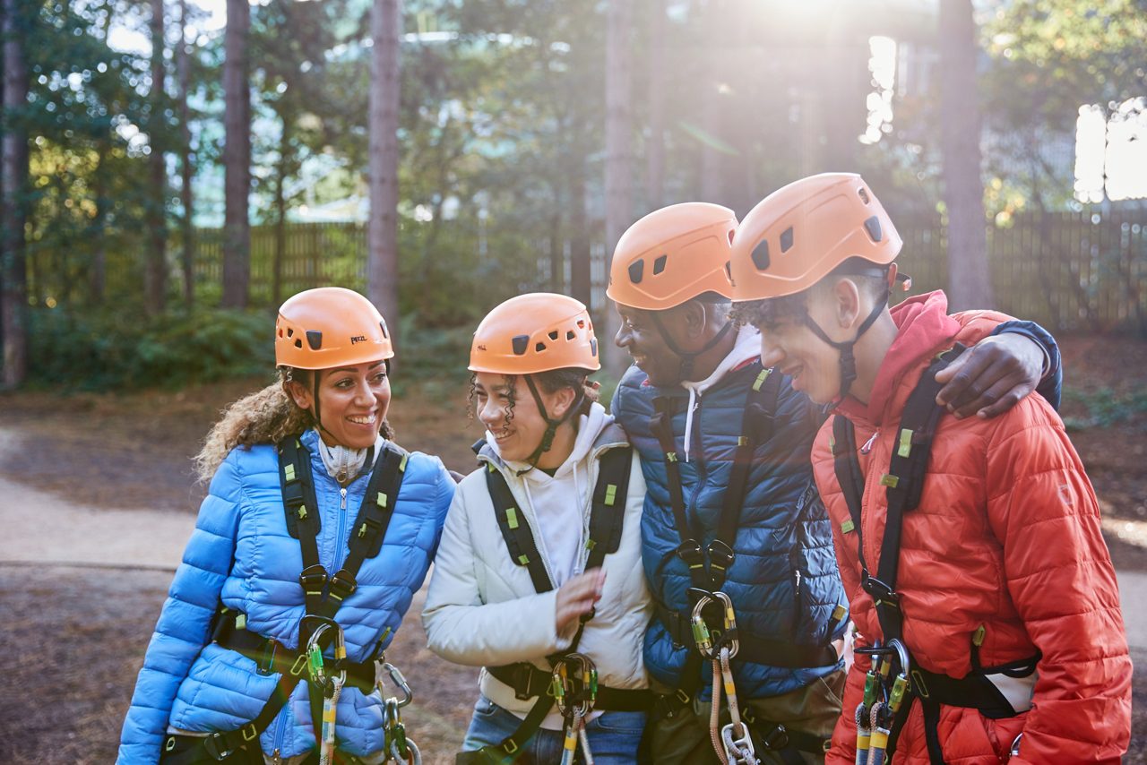 Family completing aerial adventure