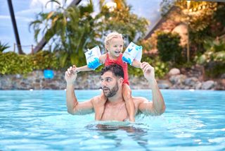 Father and daughter in the Subtropical Swimming Paradise.