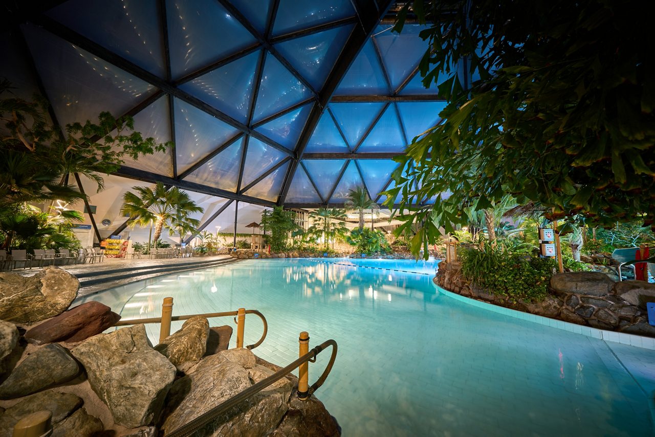 the subtropical swimming paradise with the sun coming up over the water