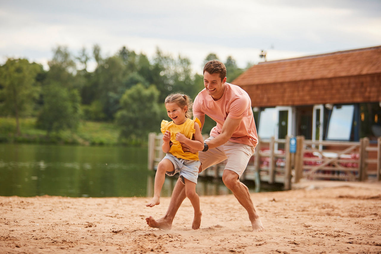 A family kayaking on the lake.