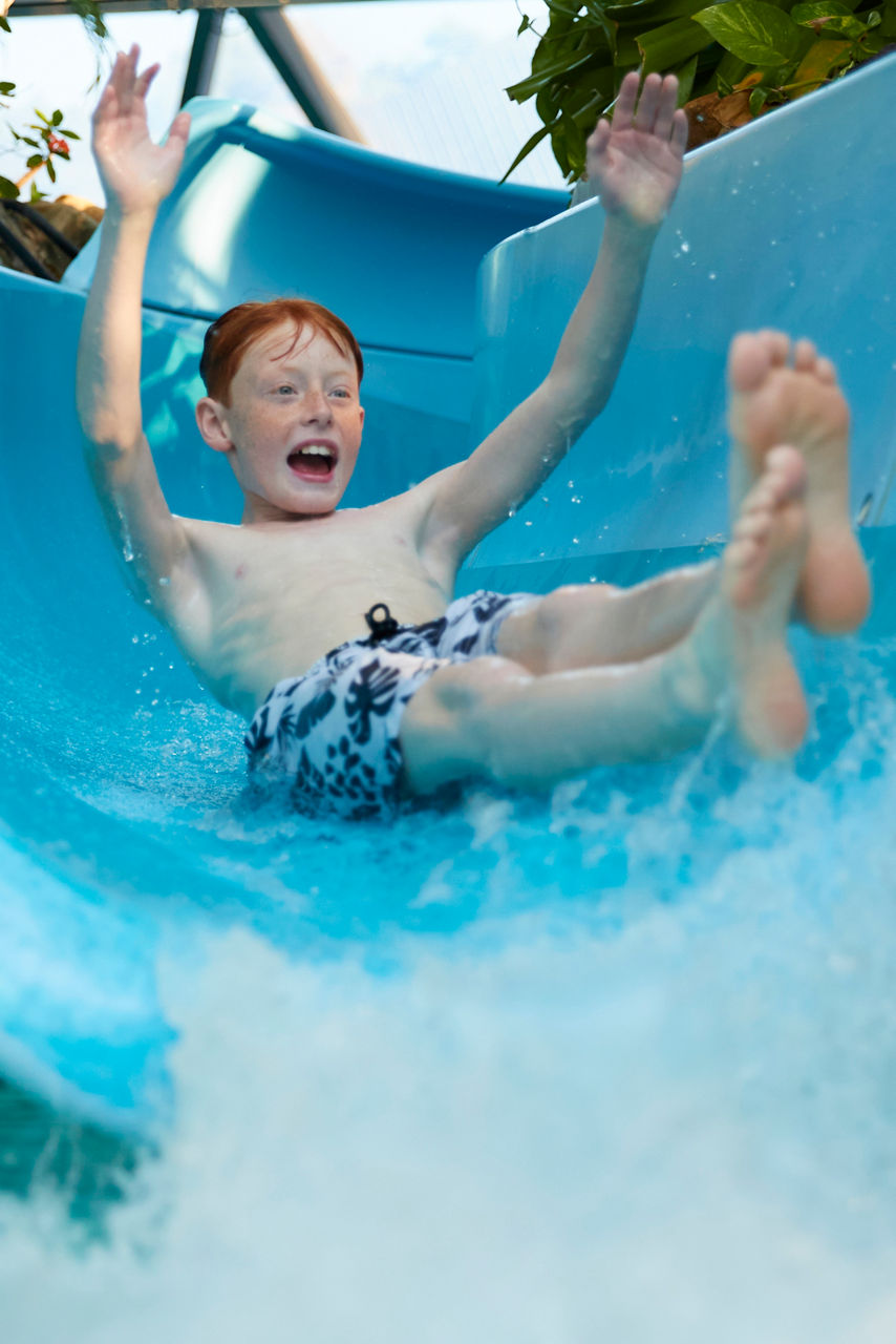 Family playing crazy golf.