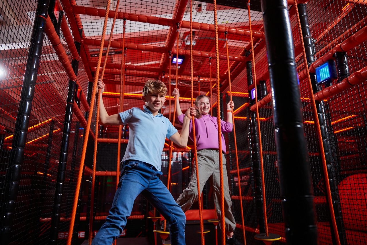 Children playing together in a bright colourful space.