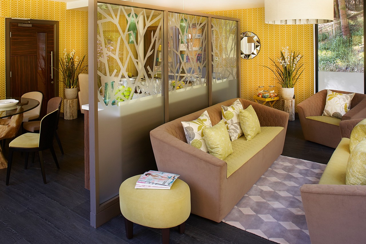 Inside the Hideaway, with soft furnishings and social spaces.