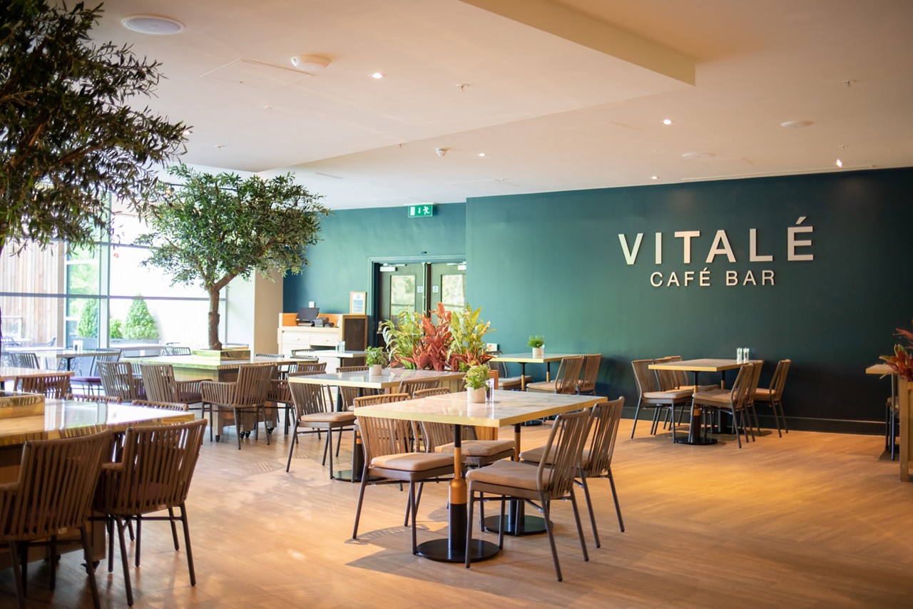 Seating in the Vitalé Café Bar with views out to the forest.