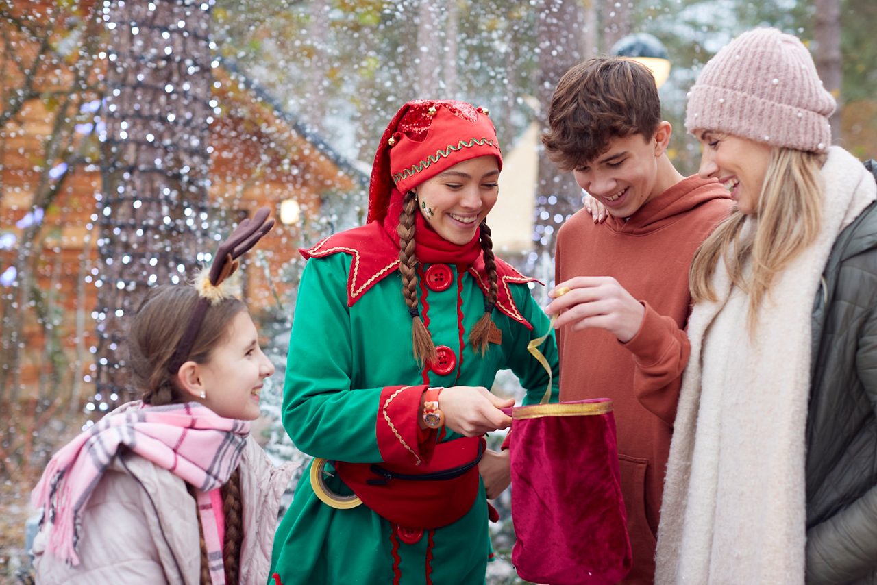family talking to elf