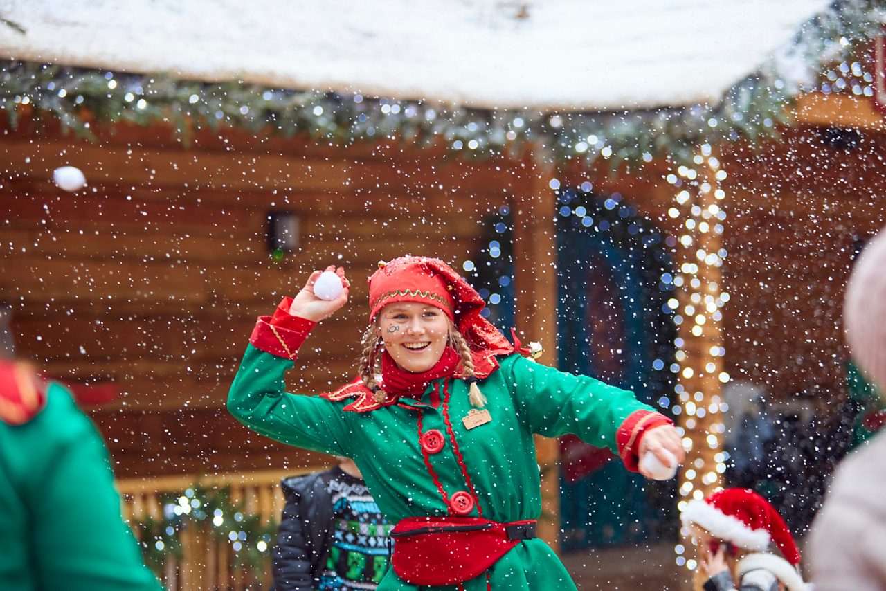 Elf throwing a snowball.