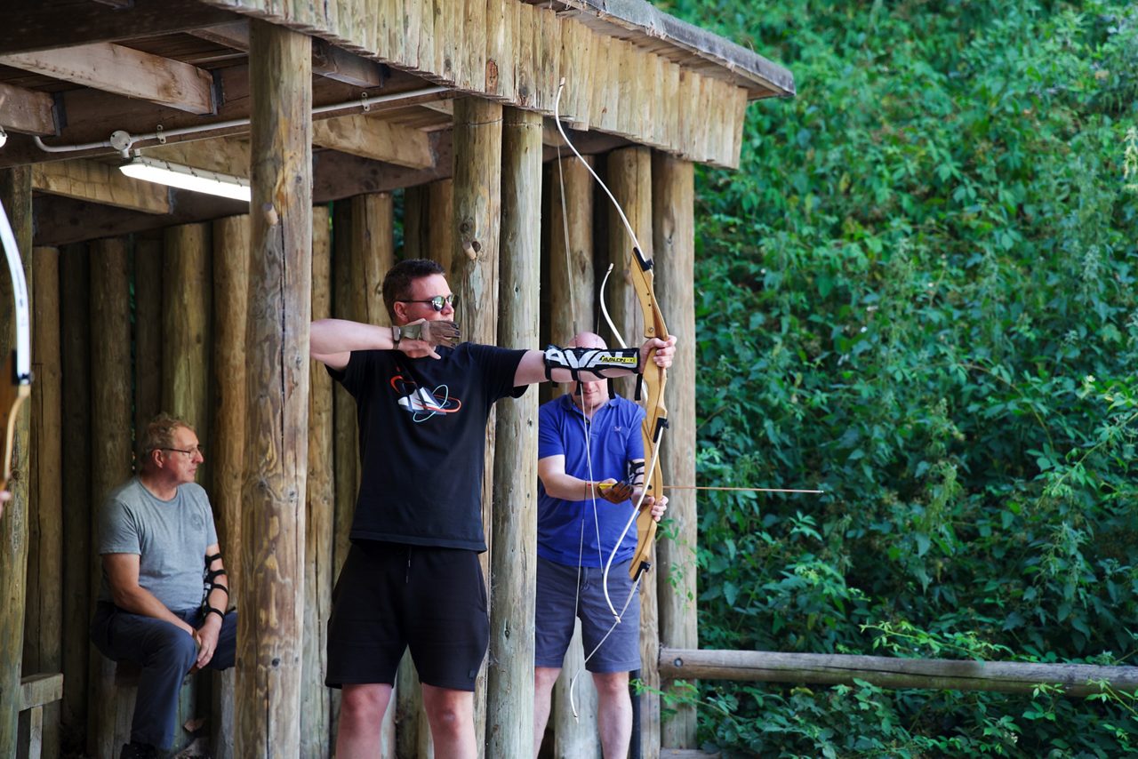 Two guests bouncing through balls in the TAG challenge arena.