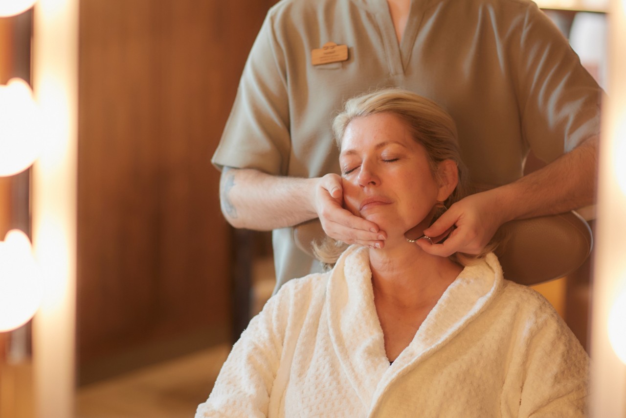 Woman having a relaxing facial treatment.