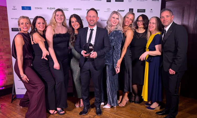 Group standing accepting an award.