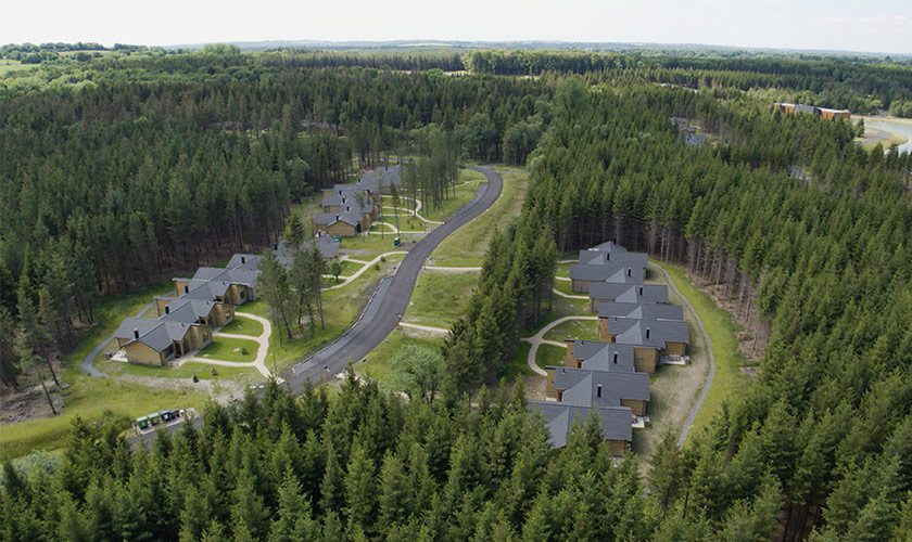 A drone shot of Longford Forest village.