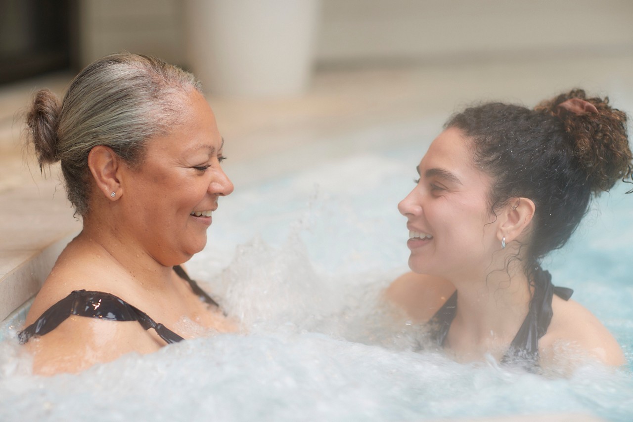 Mum and daughter in the pool