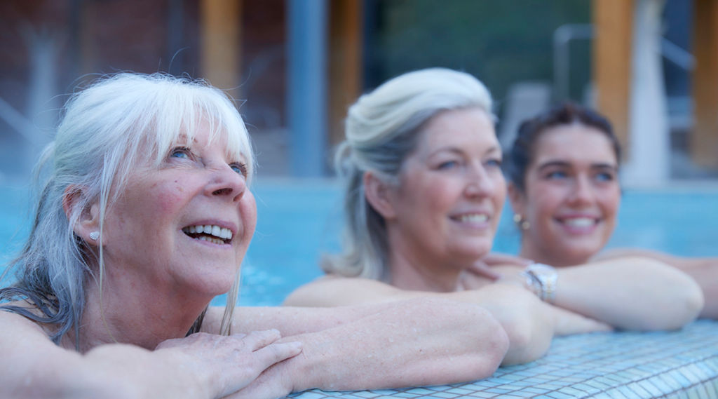 grandma, mum and daughter in the pool