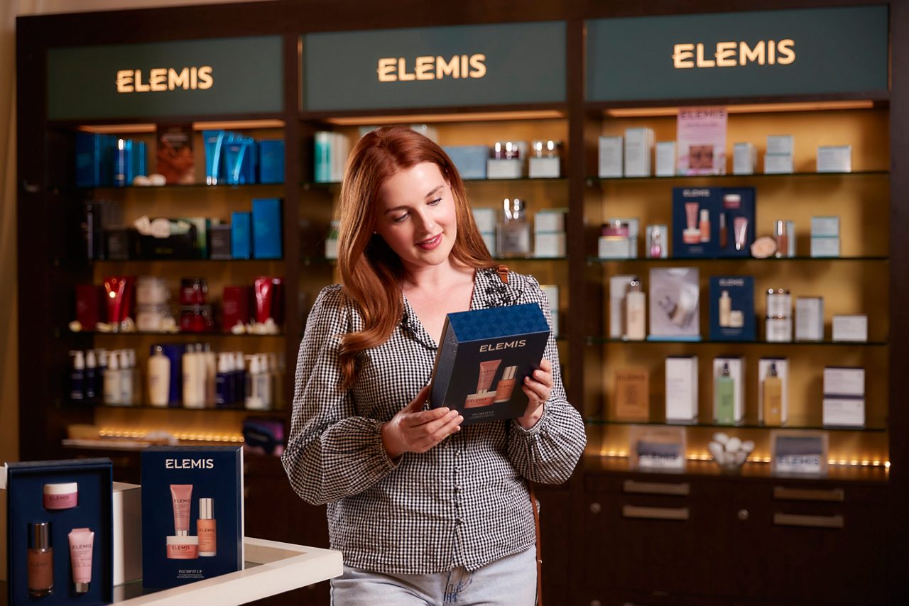 A women looking at spa products in a shop
