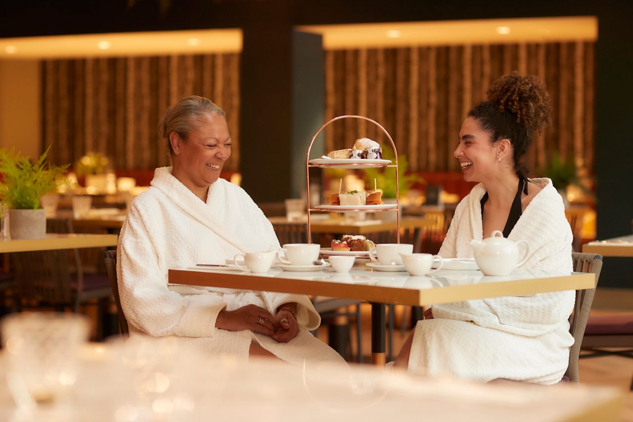 mother and daughter having afternoon tea