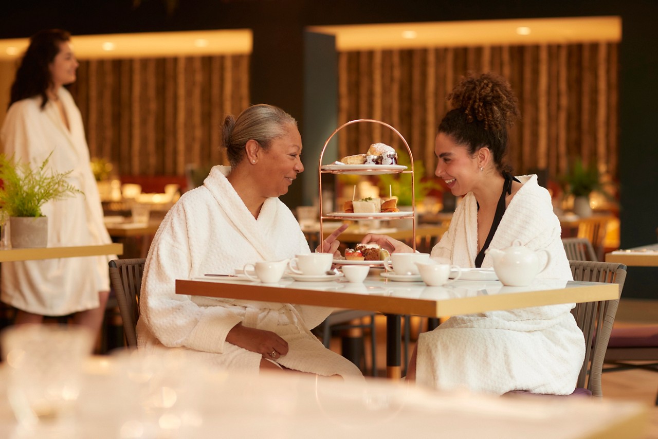 mother and daughter having afternoon tea